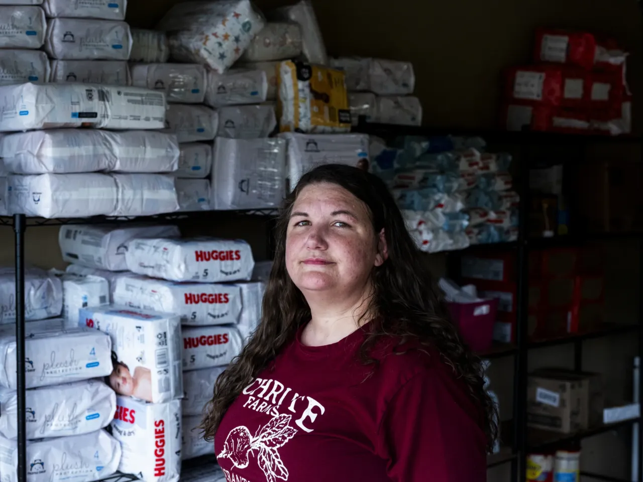 Amber Hampton is seen inside of her garage in a suburb of Memphis where she runs one of the many "immigrant pantries" in the Memphis area.
