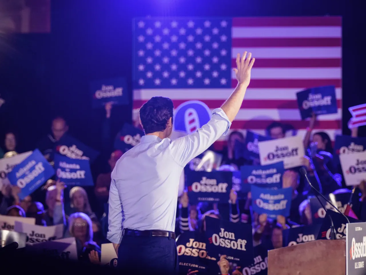 Sen. Jon Ossoff, D-Ga., waves to attendees during a reelection campaign event in Atlanta on Feb. 7.