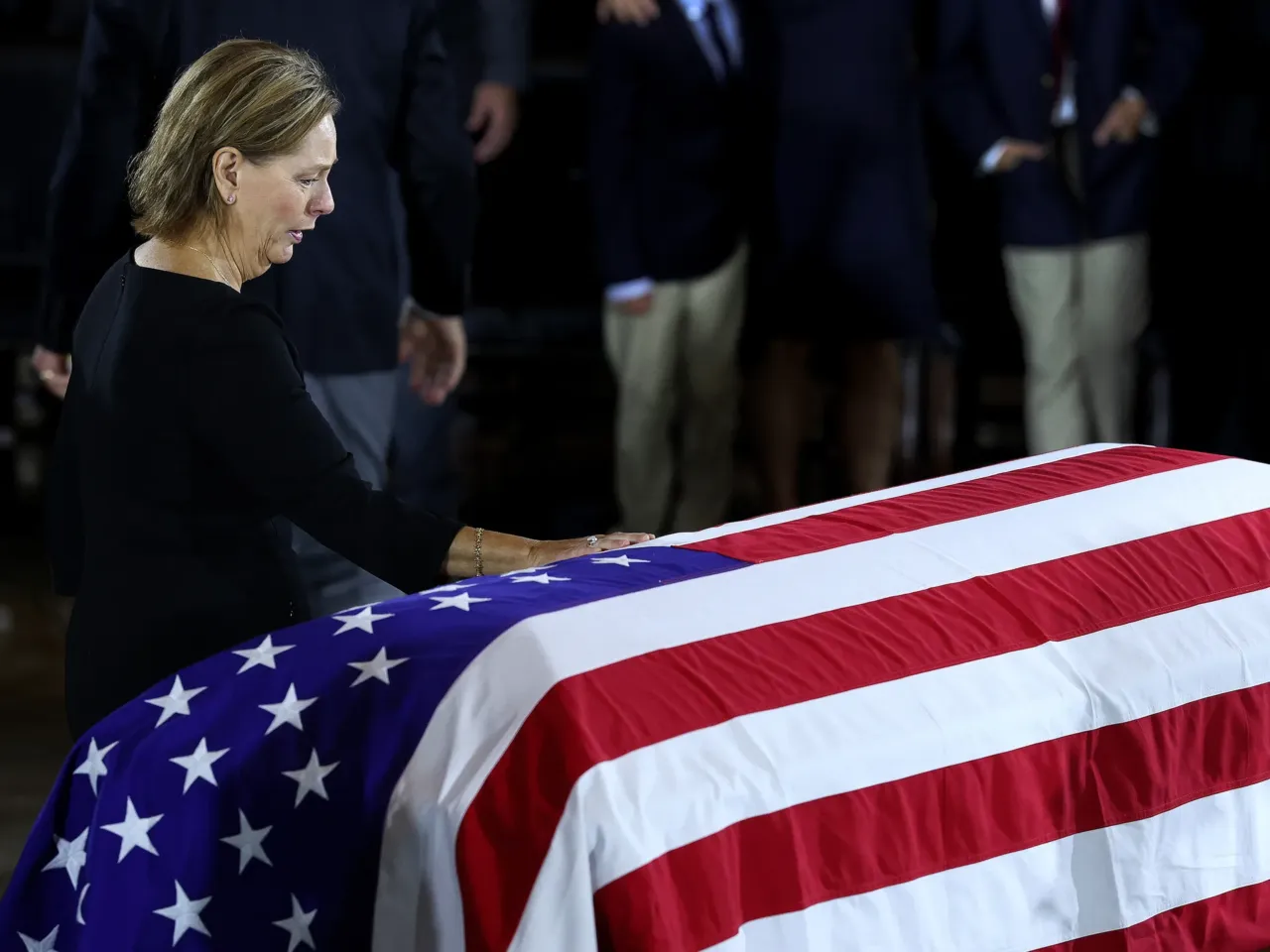 Sen. Darline Graham, R-S.C., pays her respects to her brother in the Rotunda of the U.S. Capitol.