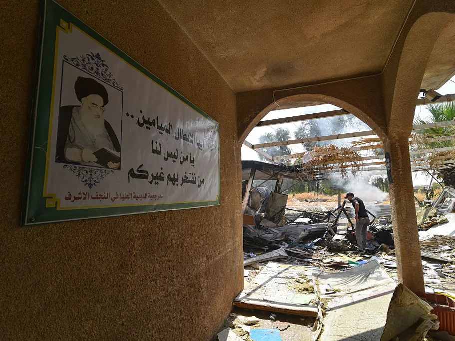 The U.S. retaliates against a 'surprise attack' by Iran in Jordan 1 A man inspects the damage at the site of a strike in Bartalla in the northern Iraqi Nineveh province on July 29, 2026.