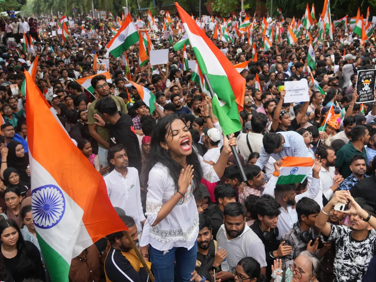 From a mother's grief to a nation's fury: How an exam leak became a political storm 3 Protesters celebrate after Education Minister Dharmendra Pradhan resigned following nationwide protests as part of the Cockroach Janta Party's protest movement in Mumbai, India, Sunday, July 26, 2026.
