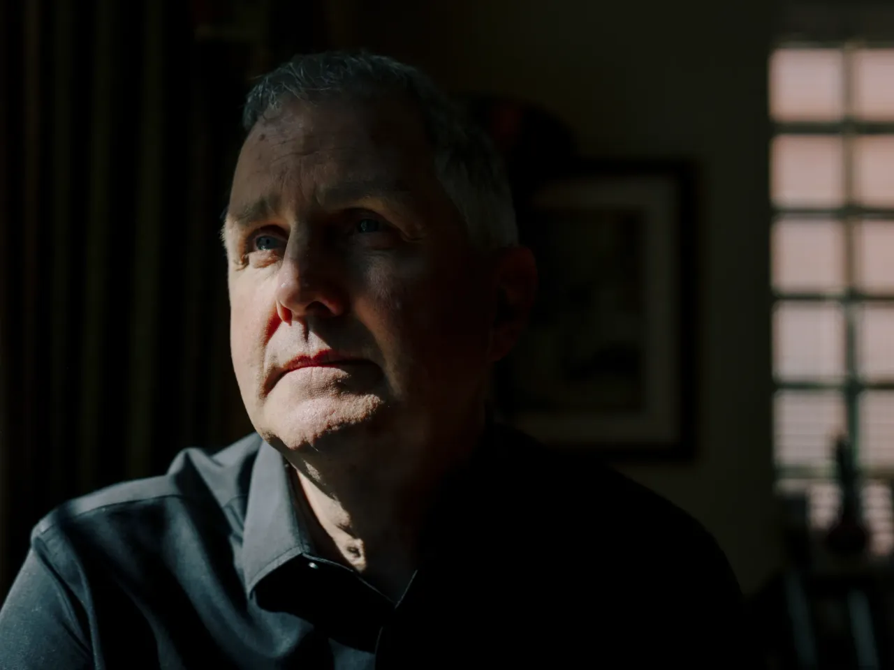She protested ICE raids. Then agents showed up at her door 5 Michael Rabbitt, a longtime Chicago, Ill., community organizer, sits for a portrait at his Chicago home on July 29. Rabbitt was one of six people charged with conspiracy following a 2025 protest outside an ICE facility in Broadview, Ill.