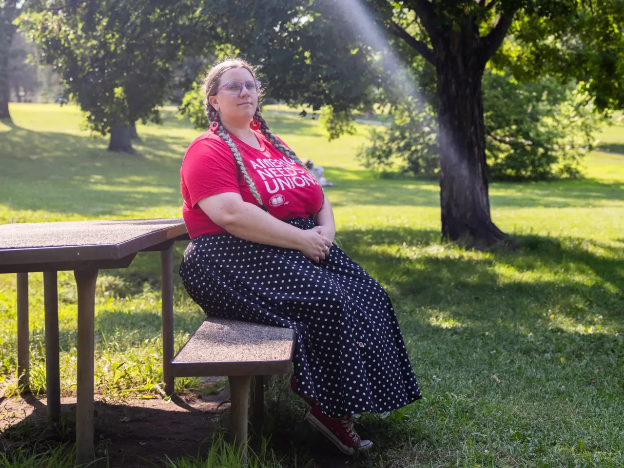 Treasure Thoreson, one of a group of protesters charged with conspiracy recently, poses for a portrait at Powderhorn Park in Minneapolis on Aug. 2, 2026.