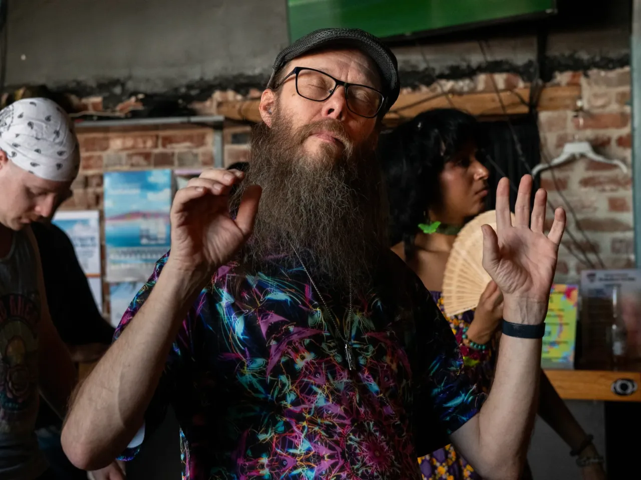 Kristopher Kaiser, of Westminster, Colo., dances as Built to Last, a Grateful Dead cover band, performs on Sunday, July 19, 2026 at Bar 404 in Denver, Colorado.