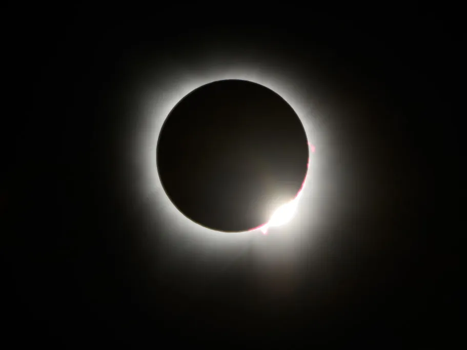 The Moon crosses in front of the Sun during a total solar eclipse at Lake Monroe on April 08, 2024 in Indiana, United States.