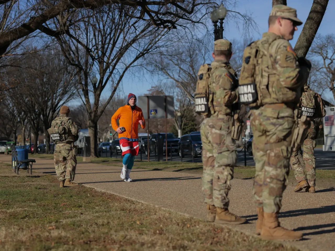 Armed troops have patrolled D.C. for 1 year now. It's challenging democratic norms 1 Members of the National Guard patrols along Constitution Ave. on December 01, 2025 in Washington, D.C.