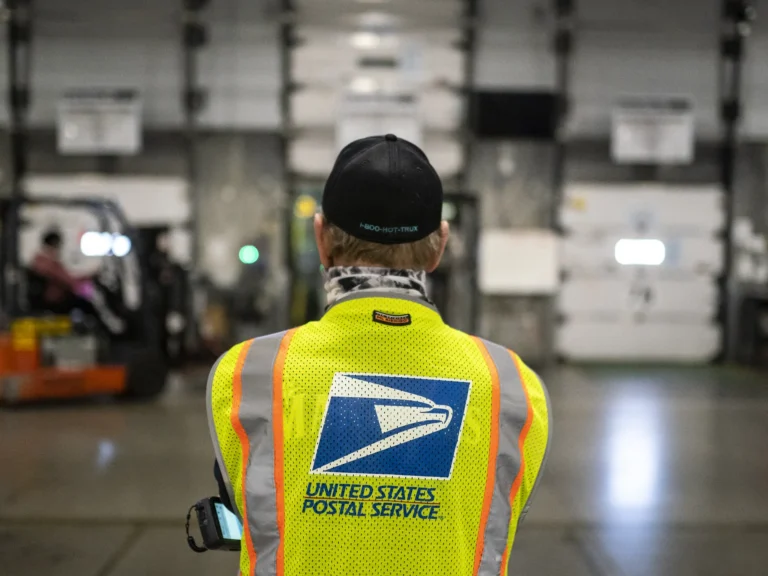 A judge expands a block on U.S. Postal Service work on Trump’s mail-in voting order